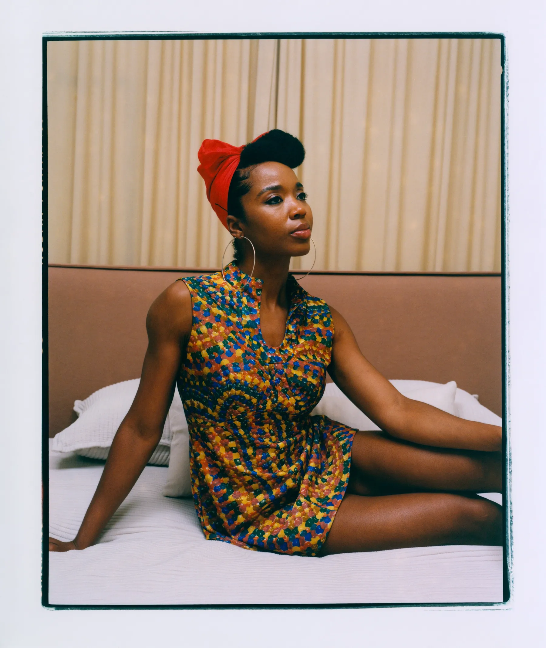 image of person sitting on bed